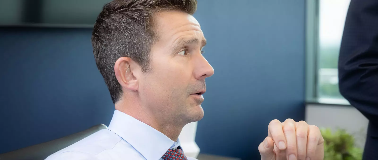 William Dunn in meeting