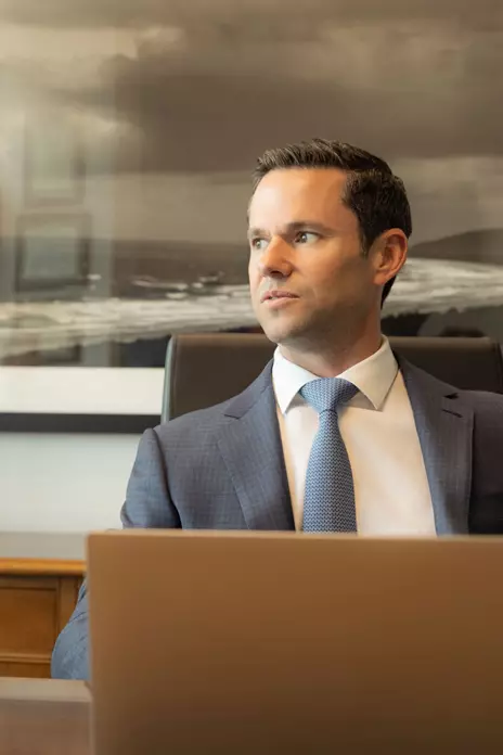 Connor Sheehan at desk